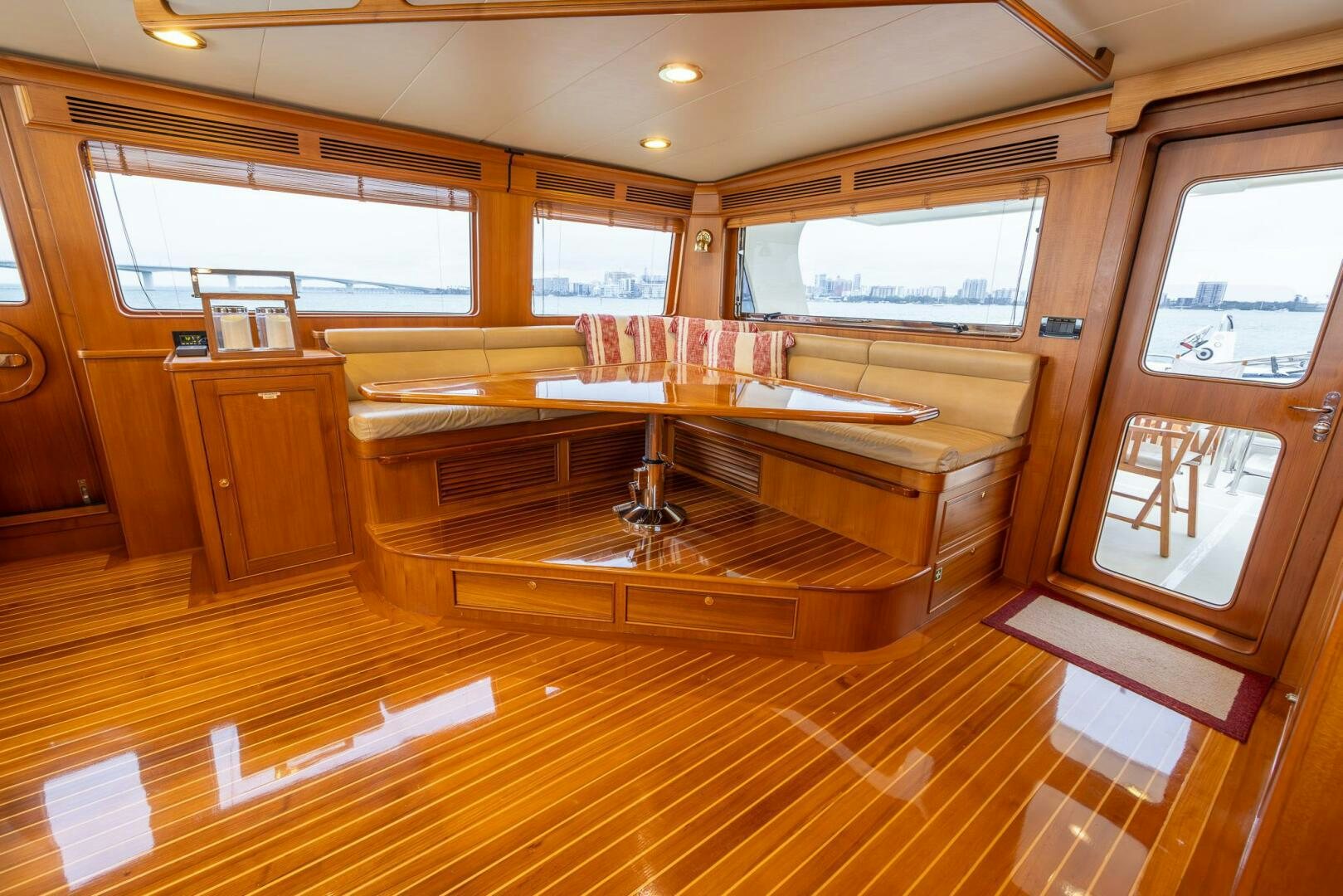 a room with a table and chairs aboard INDIGO Yacht for Sale