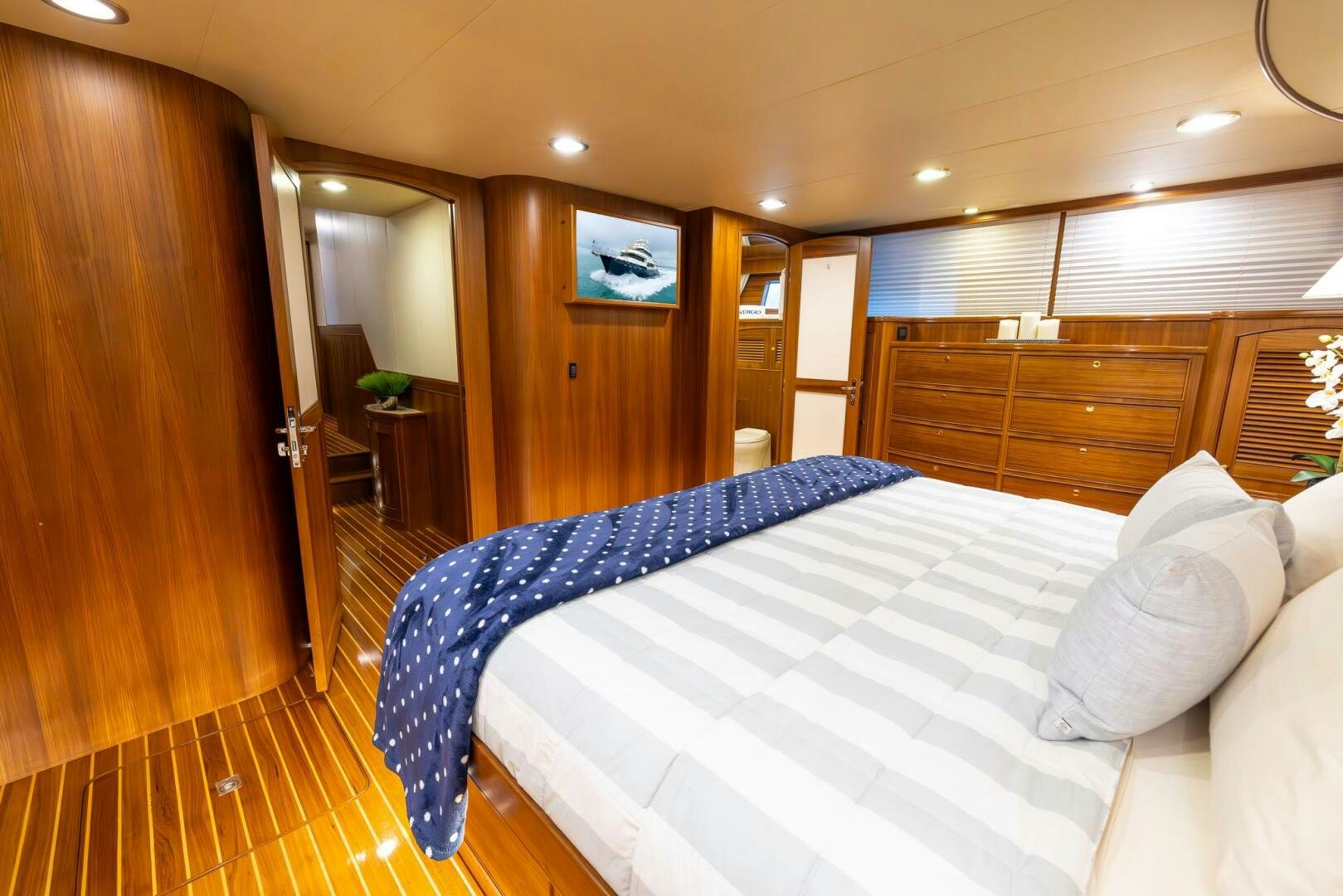 a bed in a room aboard INDIGO Yacht for Sale