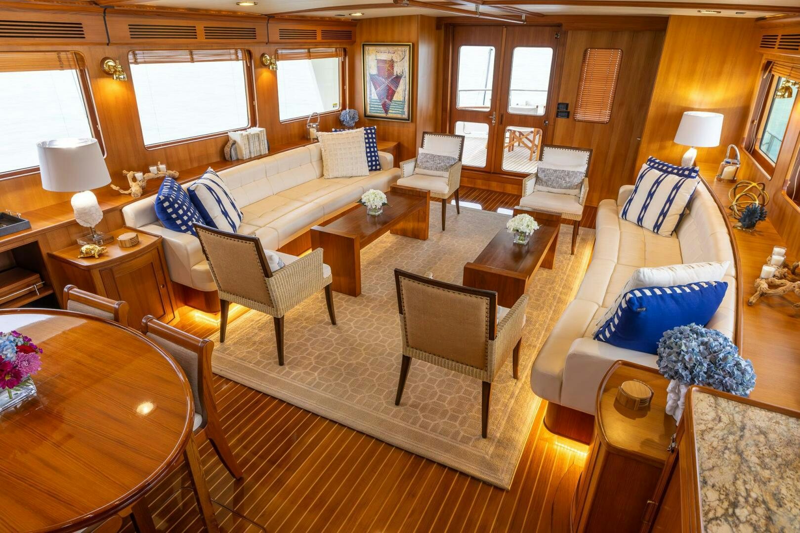 a living room with a large window aboard INDIGO Yacht for Sale