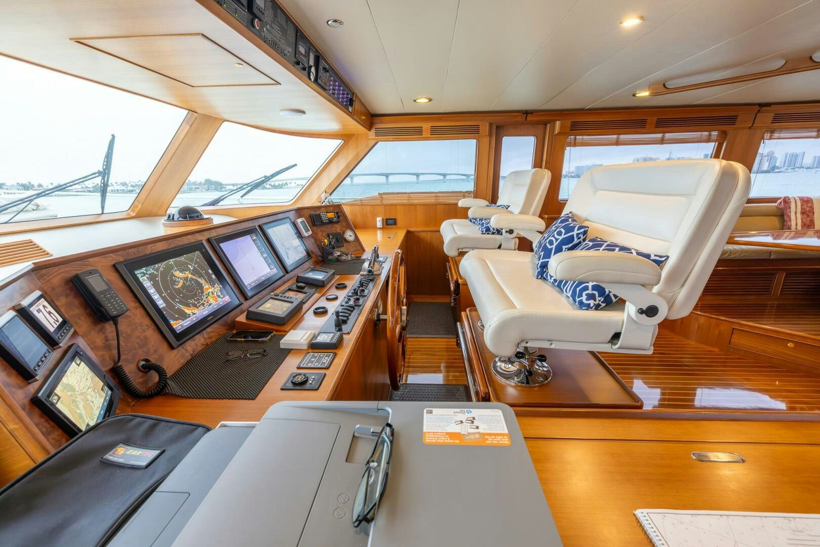 inside of a vehicle with a desk and a bed aboard INDIGO Yacht for Sale