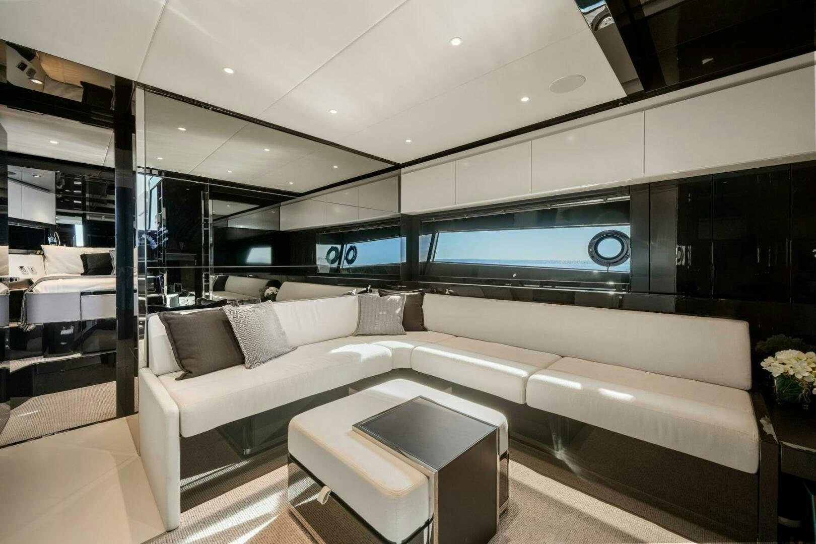 a modern looking living room aboard BLUEPRINT Yacht for Sale