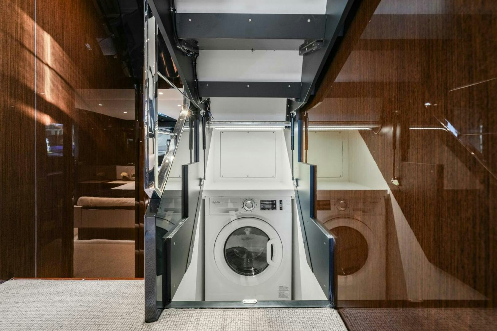 a machine in a room aboard BLUEPRINT Yacht for Sale