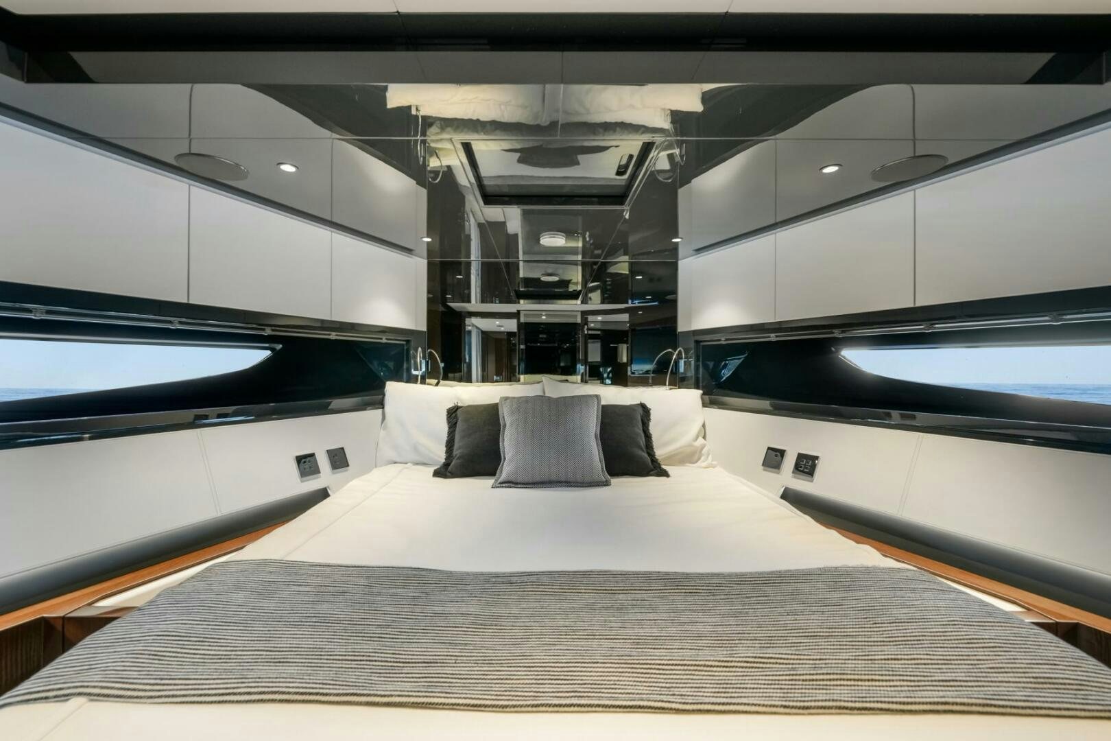 a bed in a room aboard BLUEPRINT Yacht for Sale