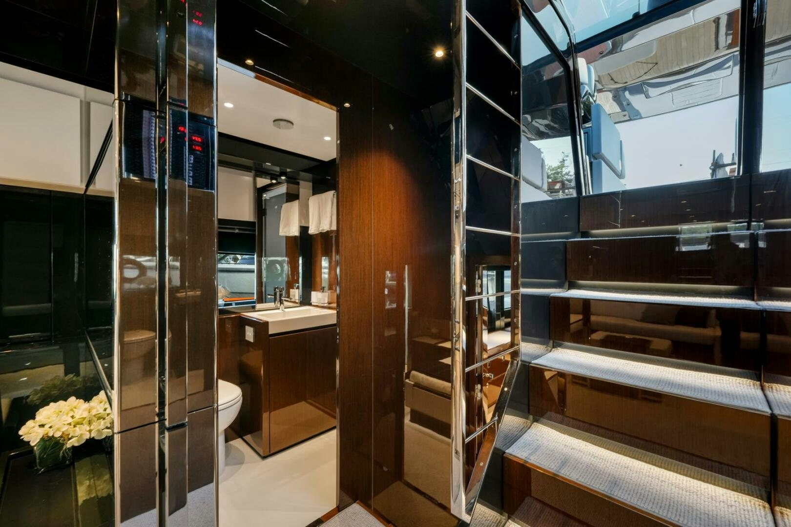 a room with glass doors aboard BLUEPRINT Yacht for Sale