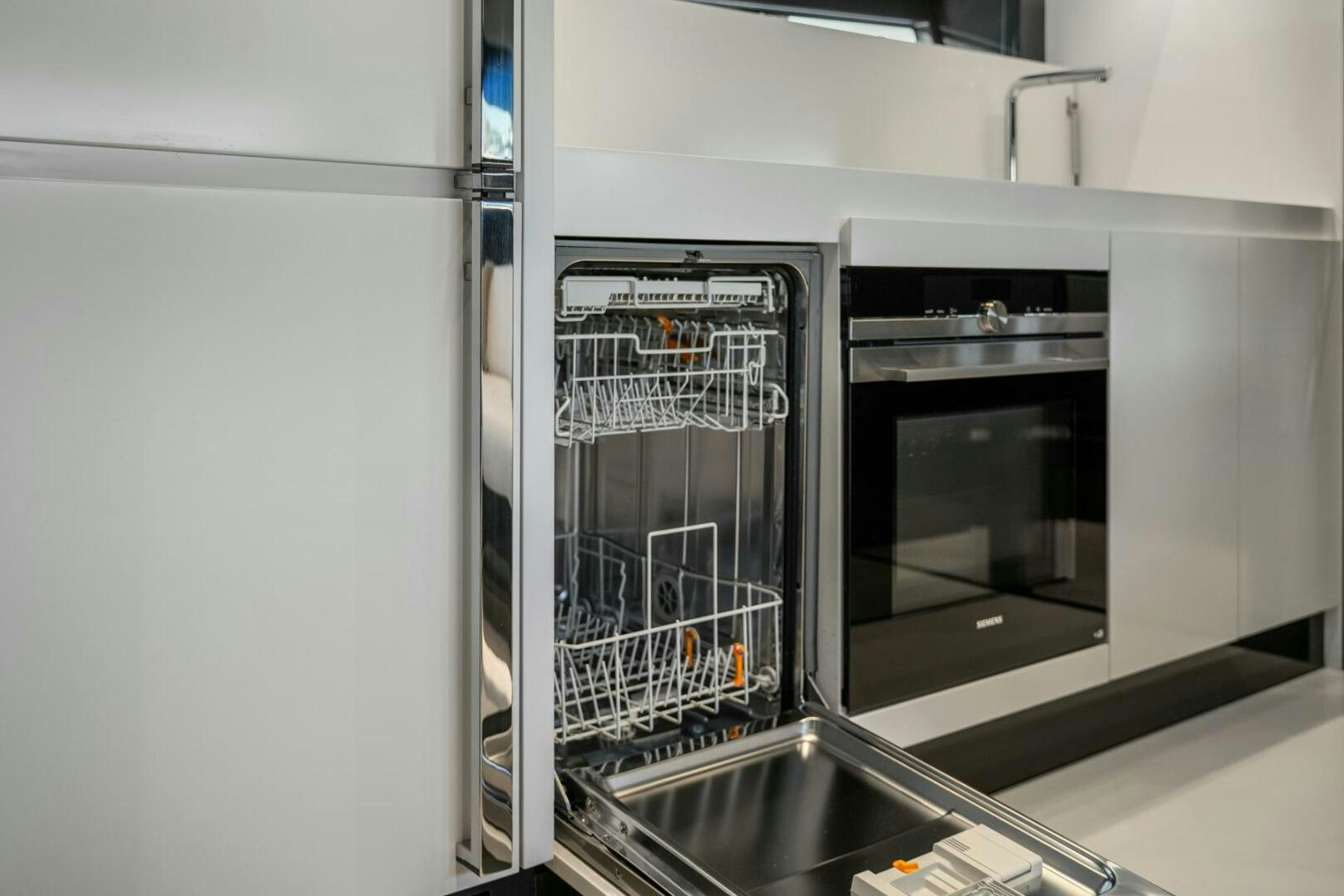 a large kitchen with a steel oven aboard BLUEPRINT Yacht for Sale