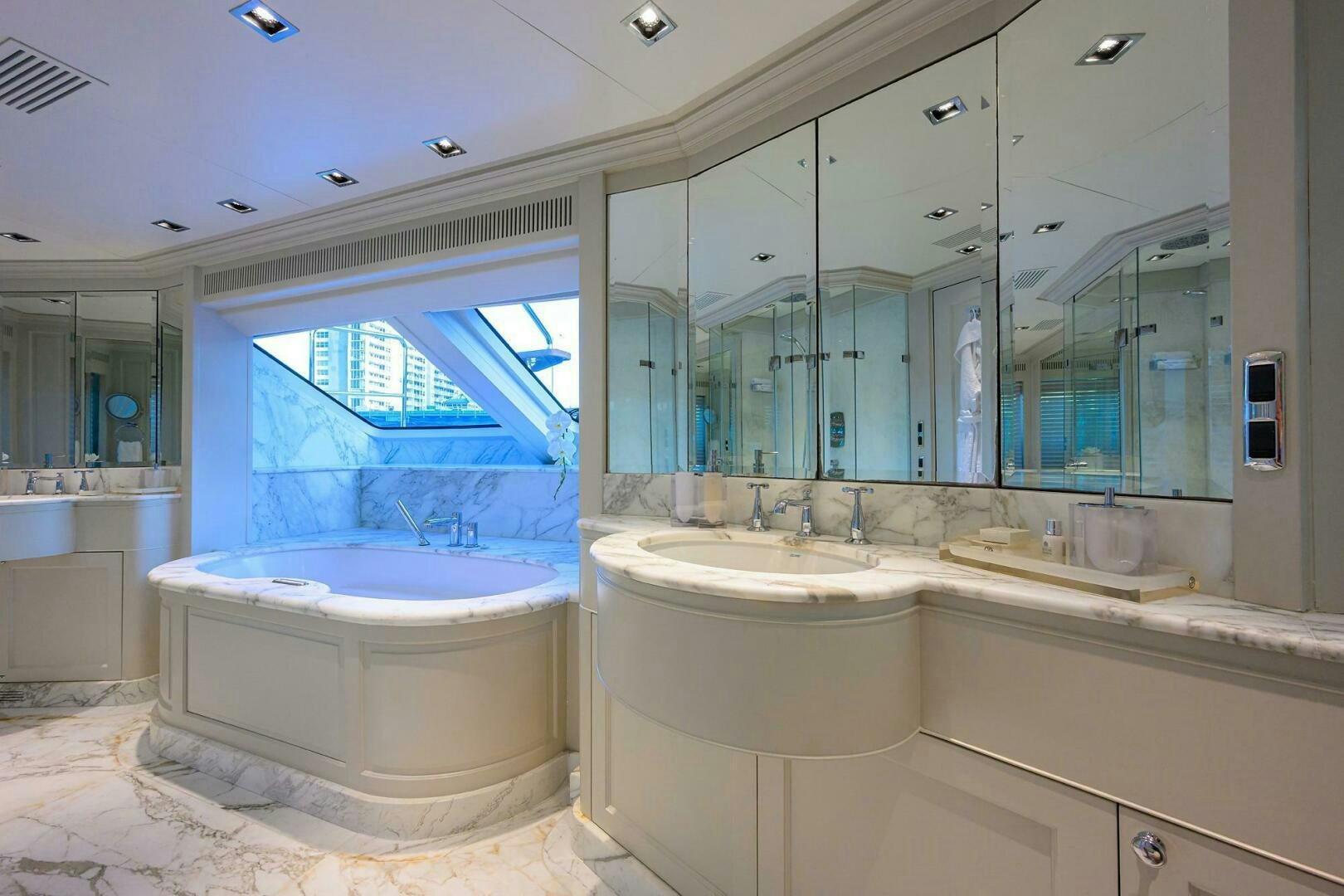 a bathroom with a large tub aboard ARTHUR’S WAY Yacht for Sale