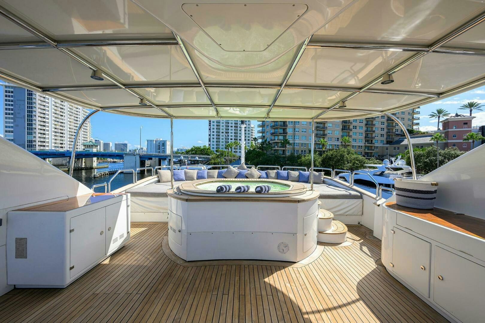a large room with a table and chairs aboard ARTHUR’S WAY Yacht for Sale