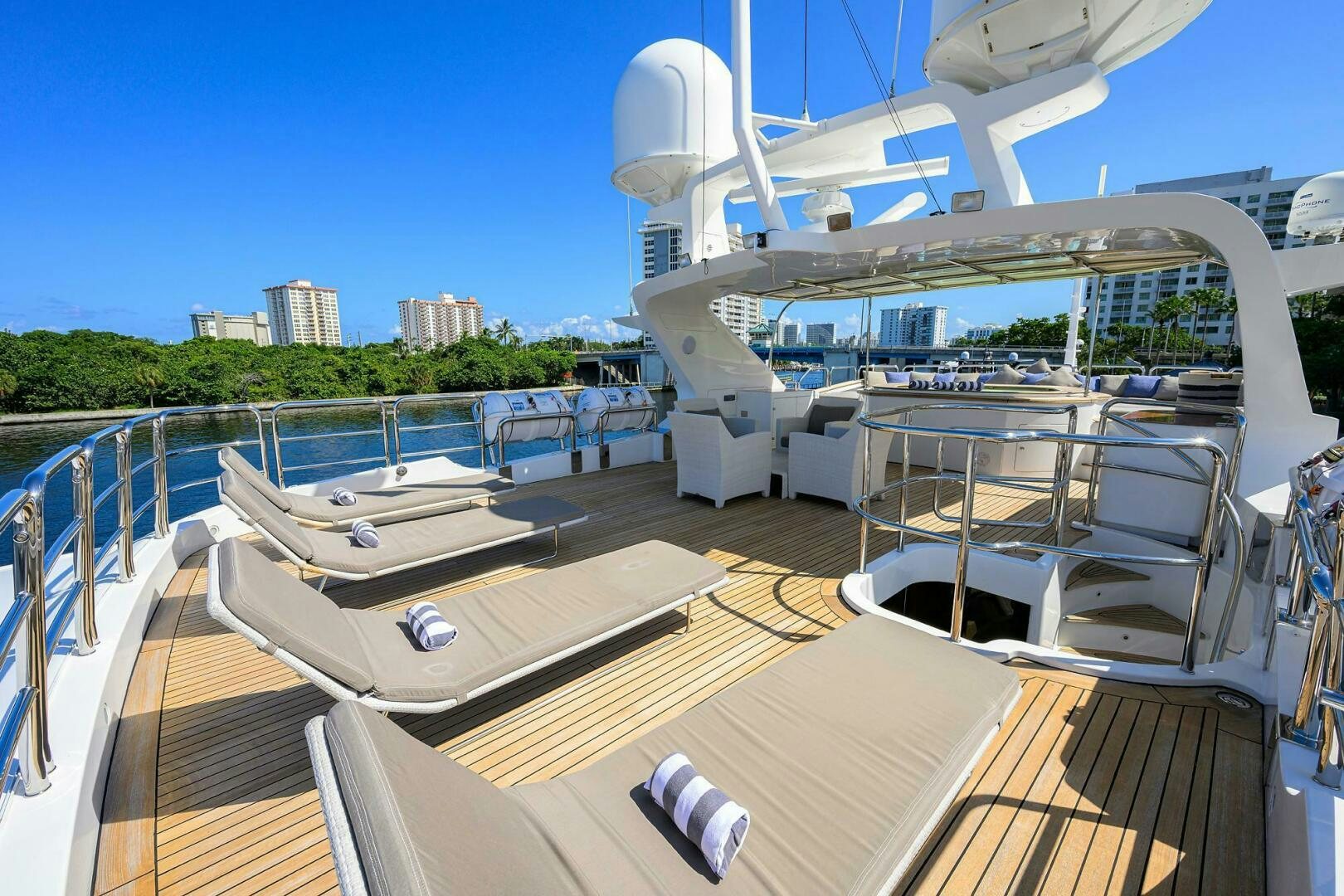 a deck with a deck and chairs on it aboard ARTHUR’S WAY Yacht for Sale
