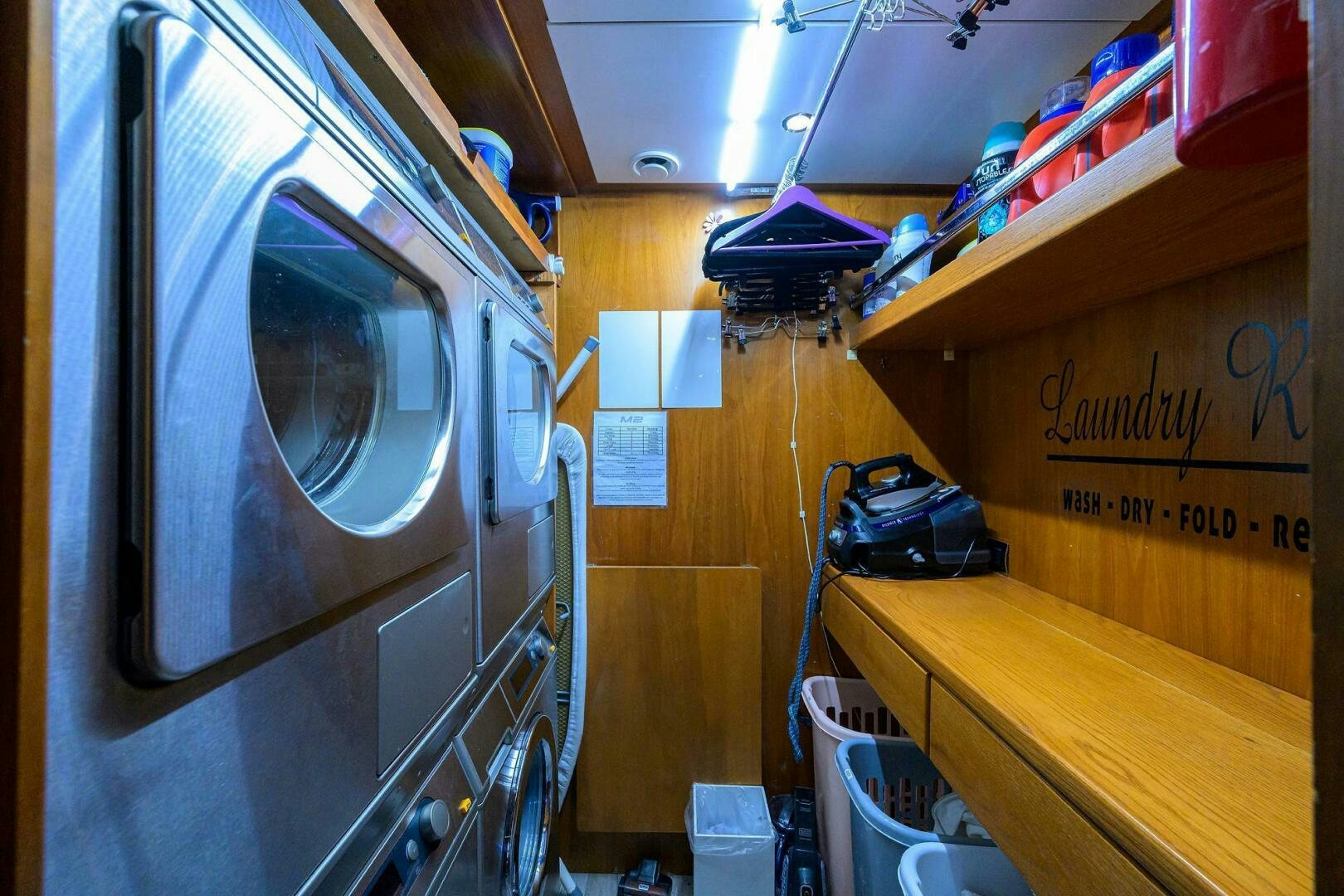 a large silver machine in a room aboard ARTHUR’S WAY Yacht for Sale