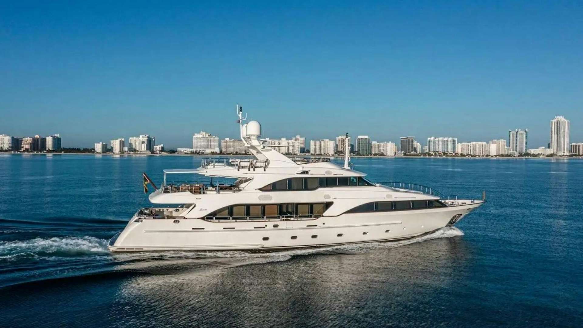 a white yacht on the water aboard ARTHUR’S WAY Yacht for Sale