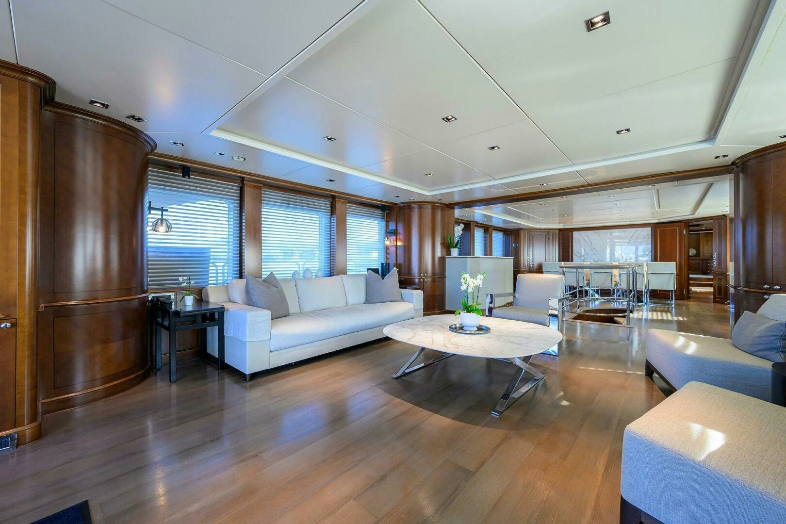 a living room with a couch and a table aboard ARTHUR’S WAY Yacht for Sale