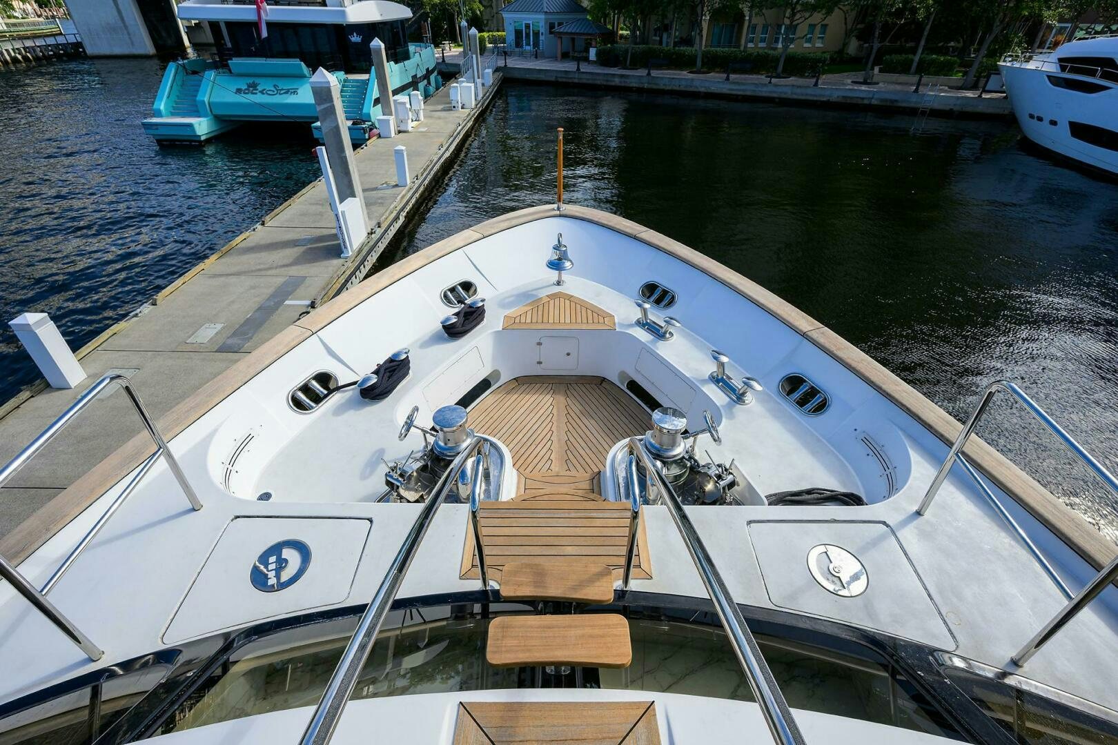a boat with a wood deck aboard ARTHUR’S WAY Yacht for Sale