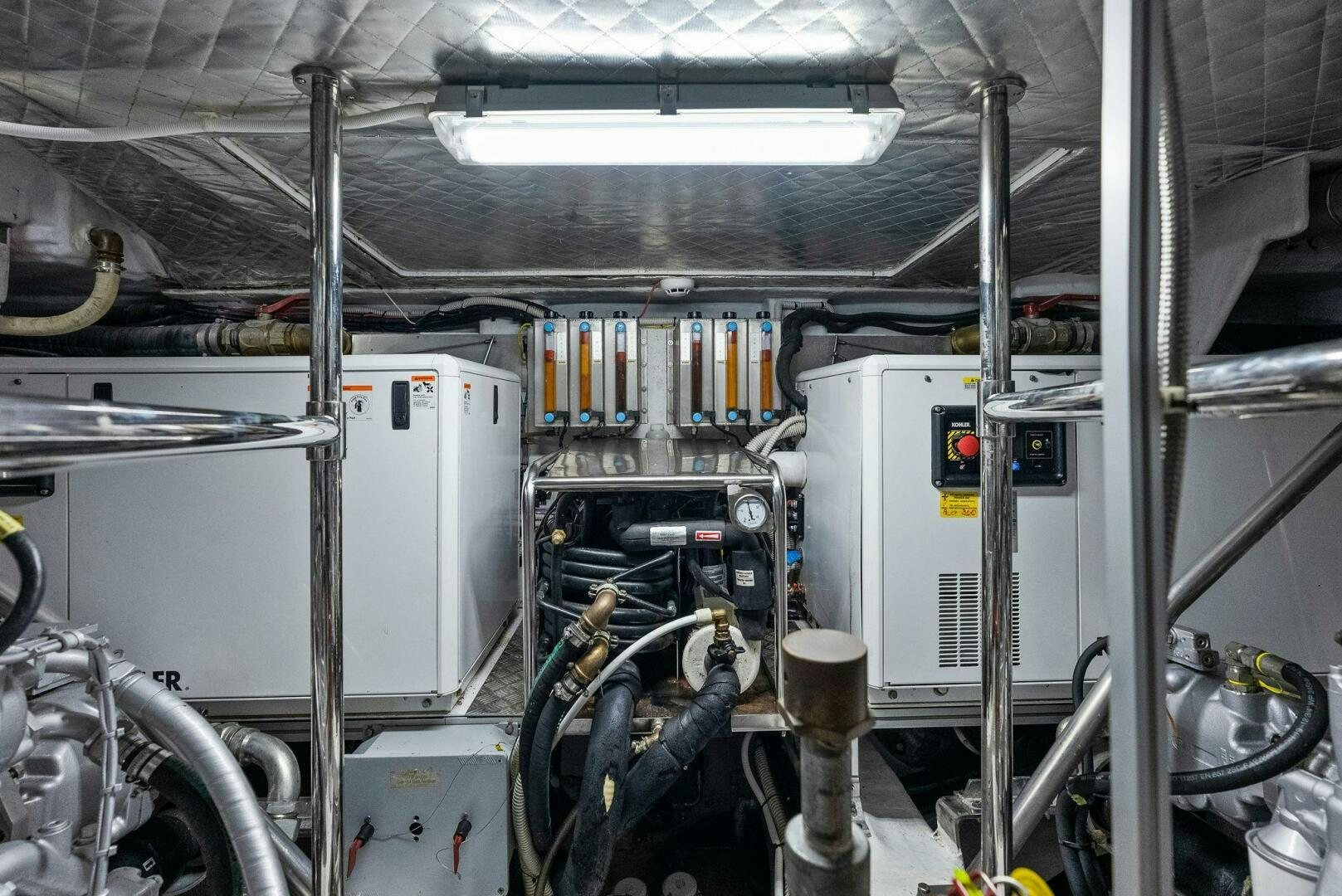 a factory with several machines aboard PHOENIX RISING Yacht for Sale