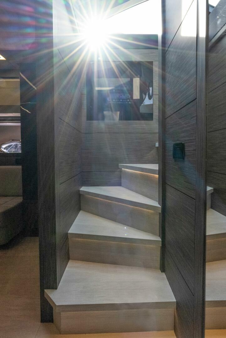a glass door with a window aboard PHOENIX RISING Yacht for Sale