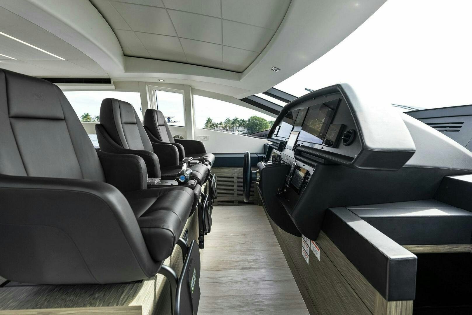 inside of a vehicle with seats aboard PHOENIX RISING Yacht for Sale