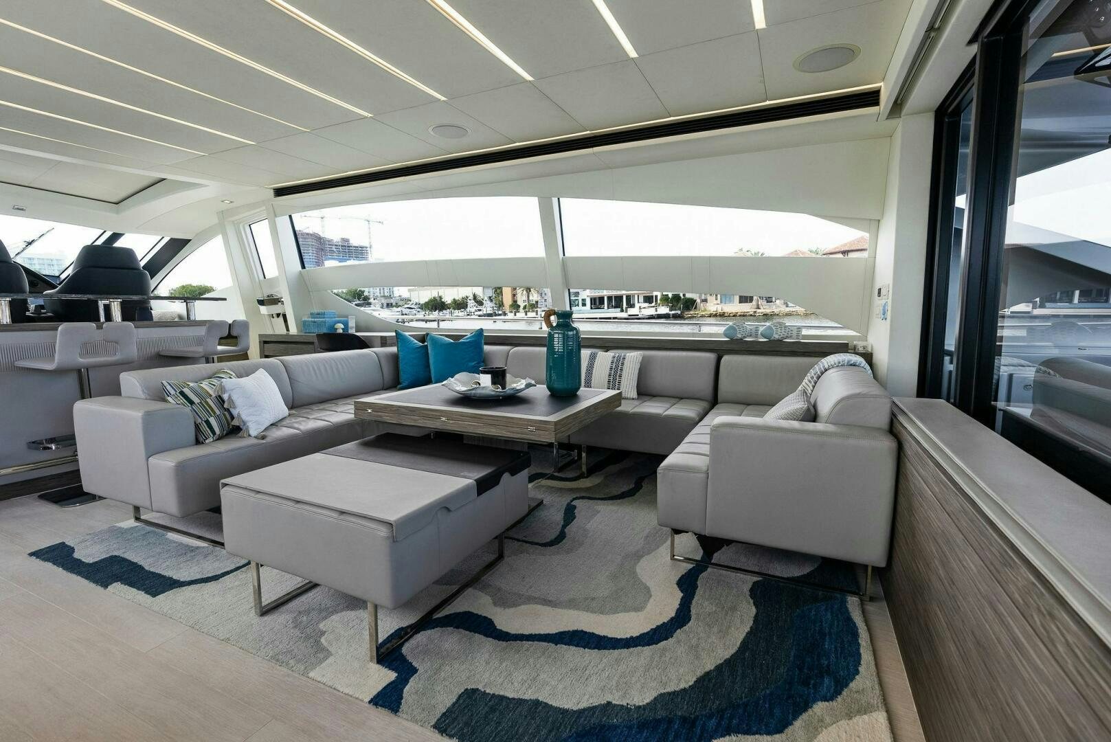 a room with a table and chairs aboard PHOENIX RISING Yacht for Sale