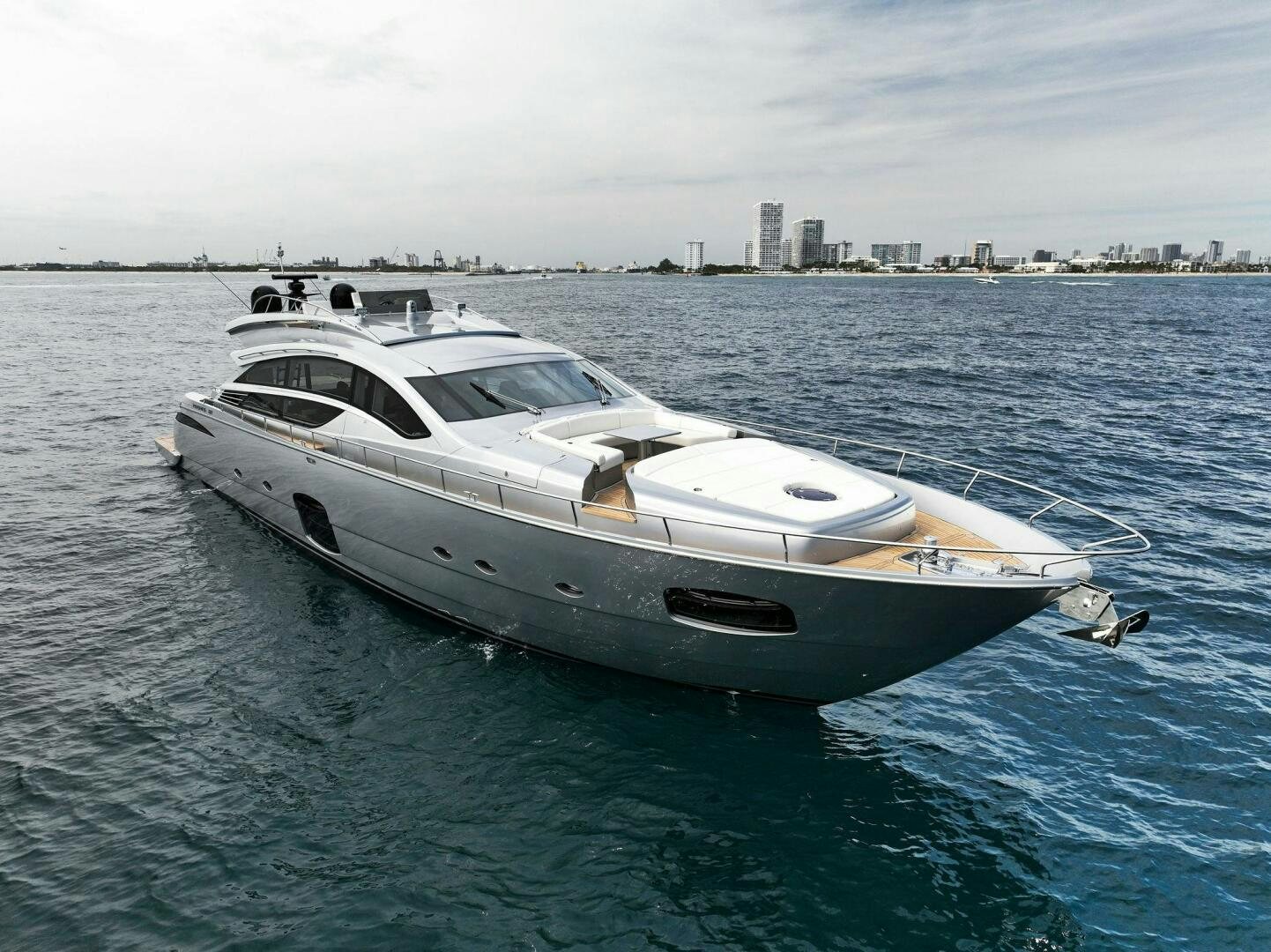 a white yacht in the water aboard PHOENIX RISING Yacht for Sale
