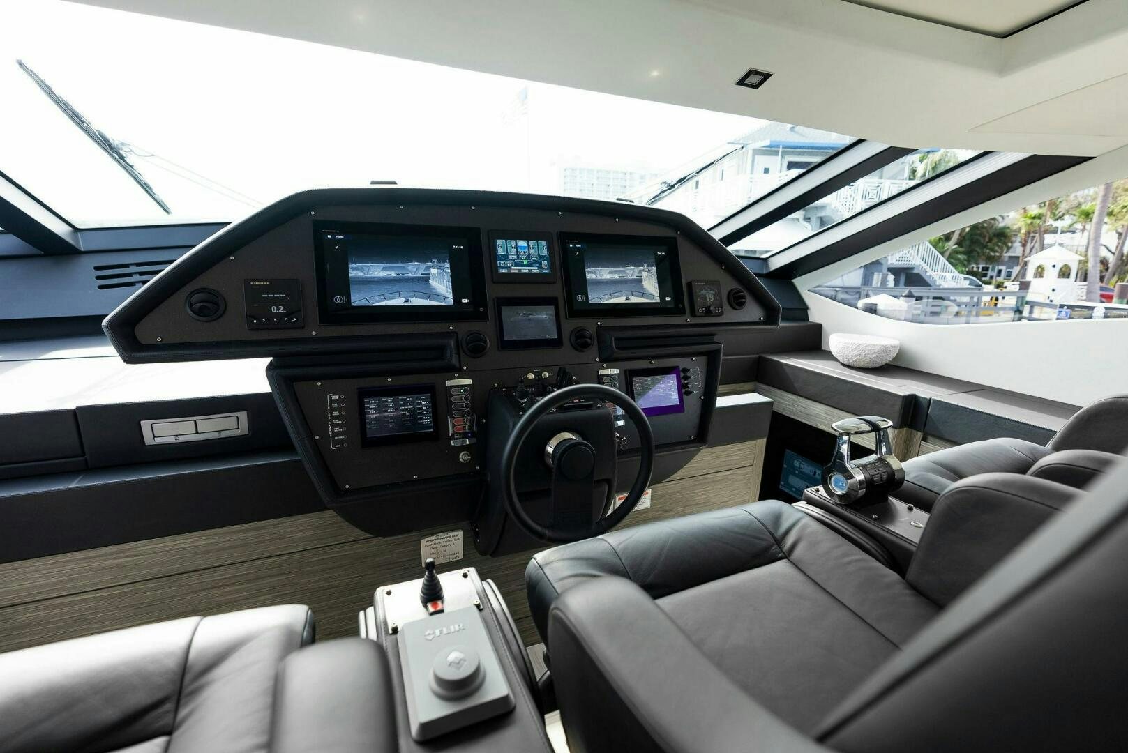 inside of a car aboard PHOENIX RISING Yacht for Sale