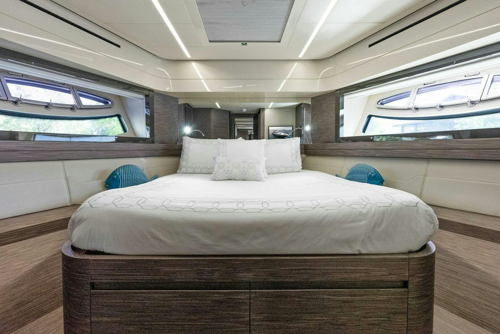 a bed in a room aboard PHOENIX RISING Yacht for Sale