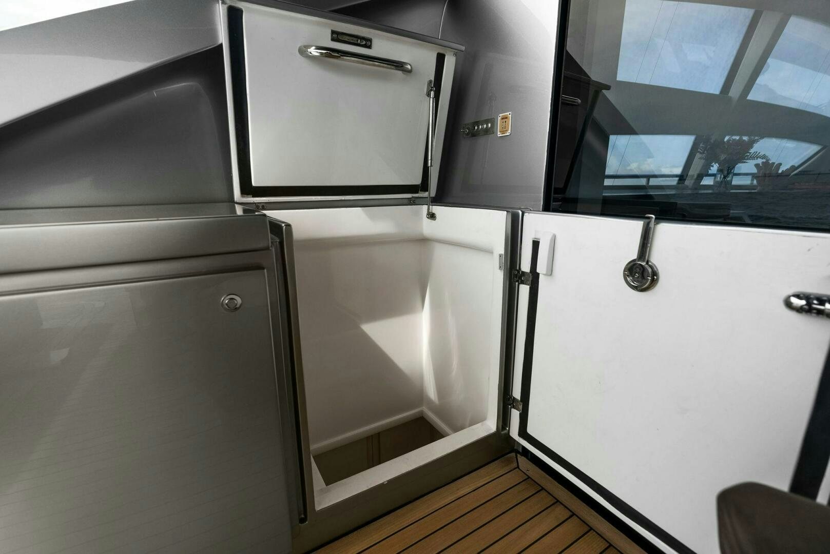 a kitchen with stainless steel appliances aboard PHOENIX RISING Yacht for Sale