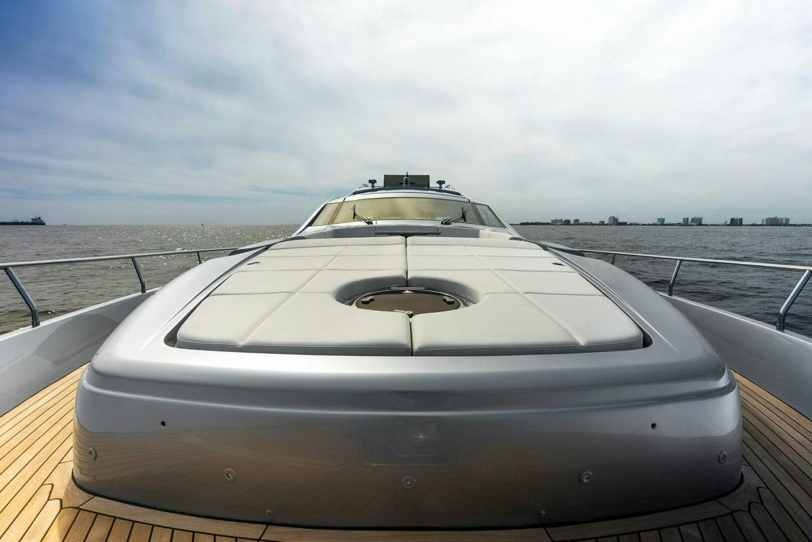 a white car on a bridge aboard PHOENIX RISING Yacht for Sale