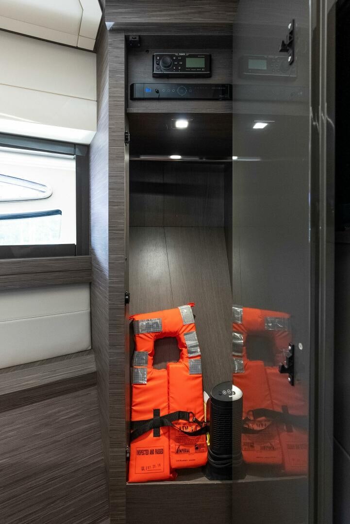 a black and orange machine aboard PHOENIX RISING Yacht for Sale