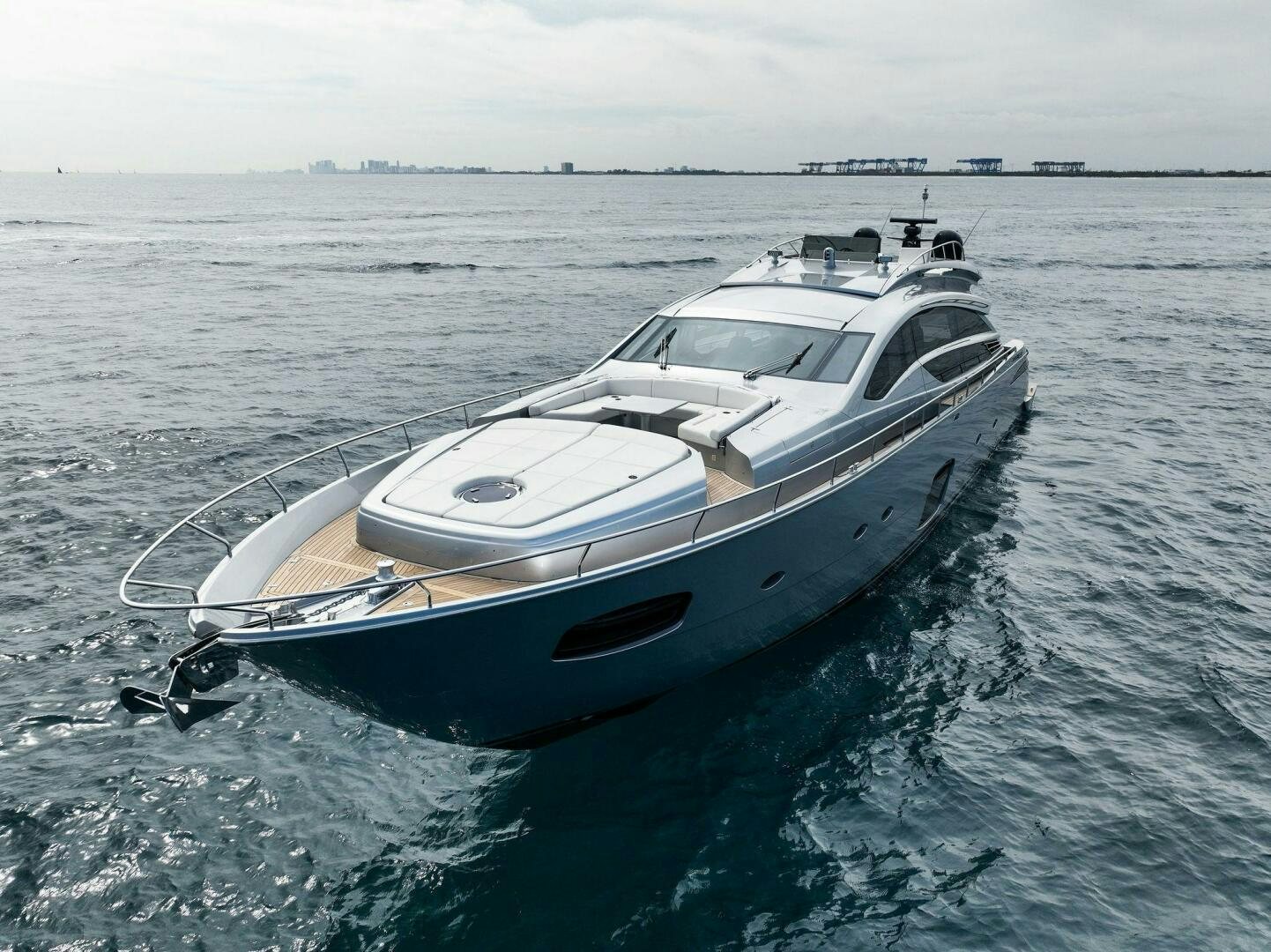 a white boat in the water aboard PHOENIX RISING Yacht for Sale