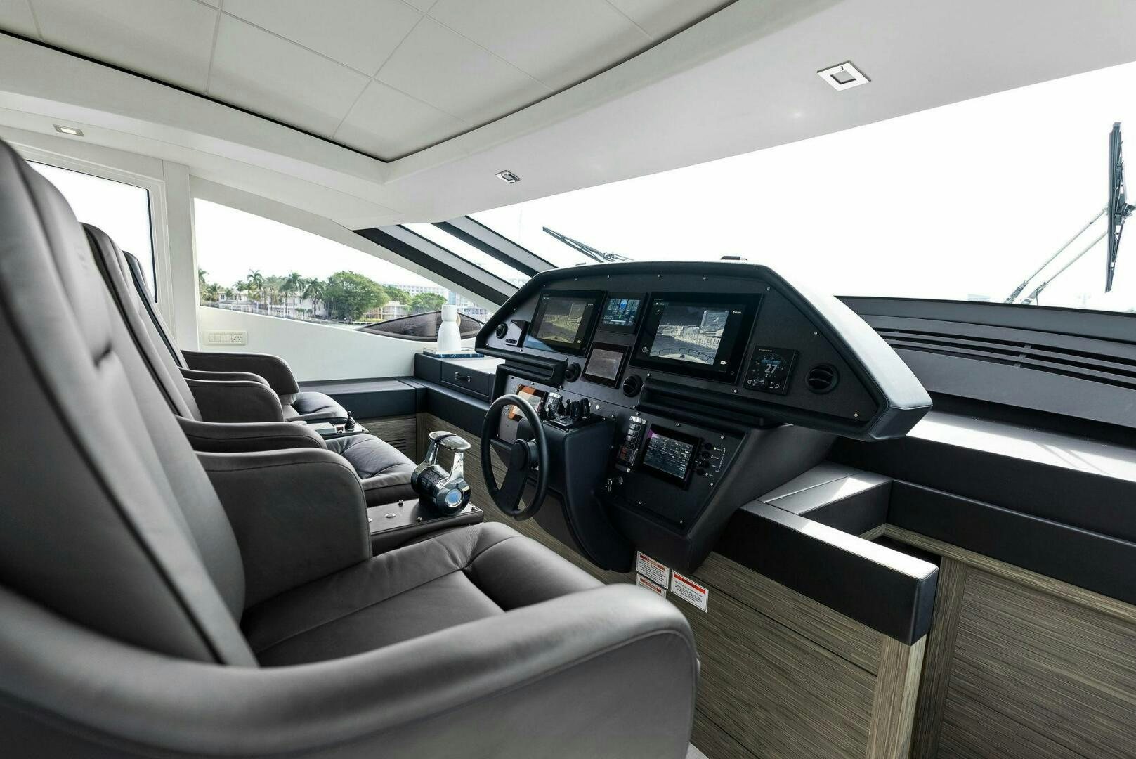 inside of a car aboard PHOENIX RISING Yacht for Sale