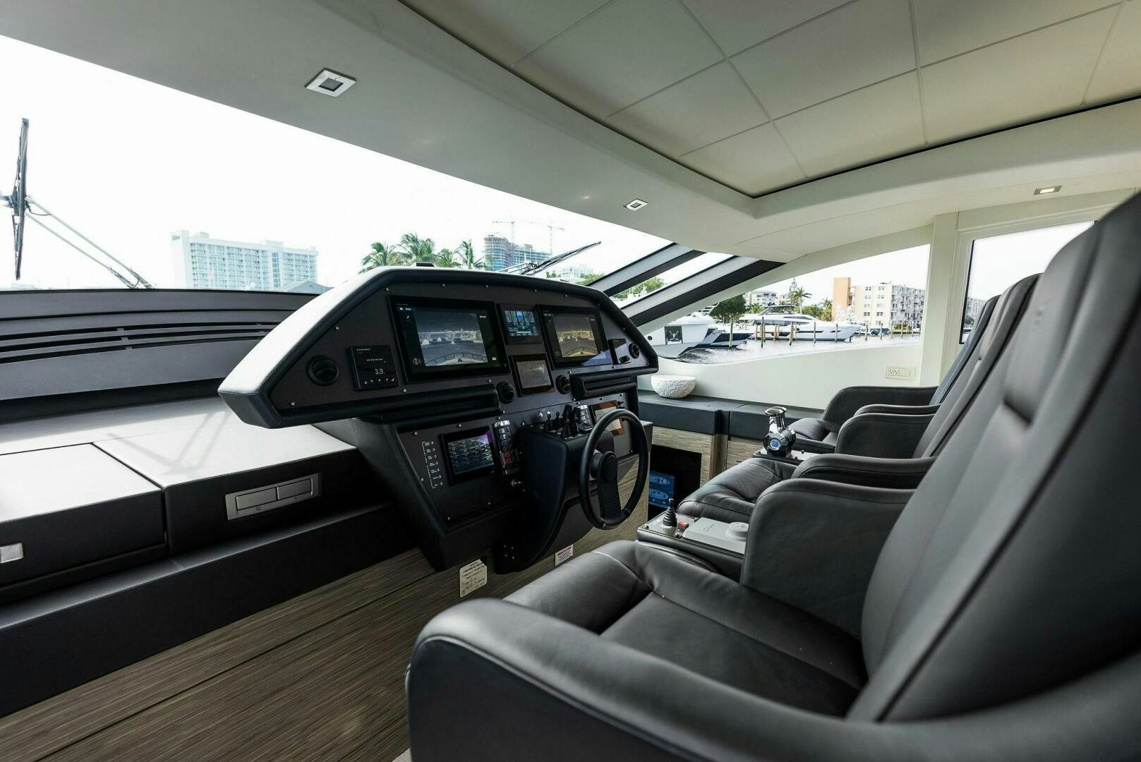 inside of a car aboard PHOENIX RISING Yacht for Sale