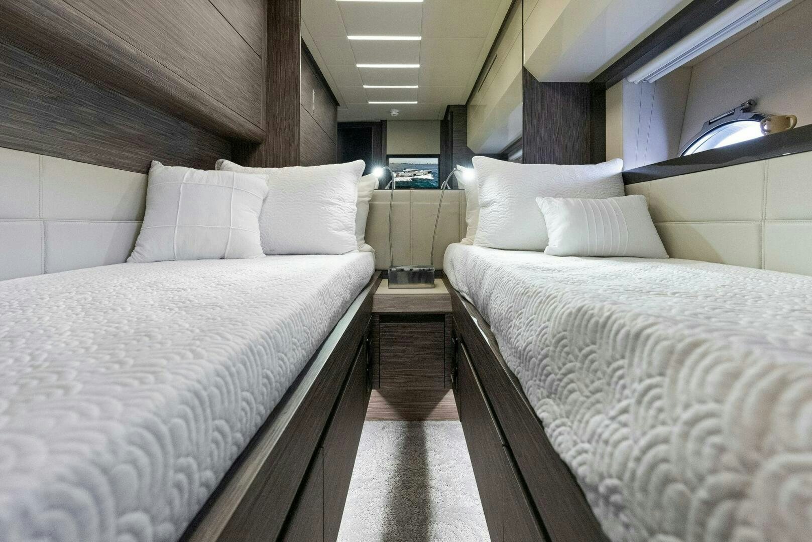 a room with two beds aboard PHOENIX RISING Yacht for Sale