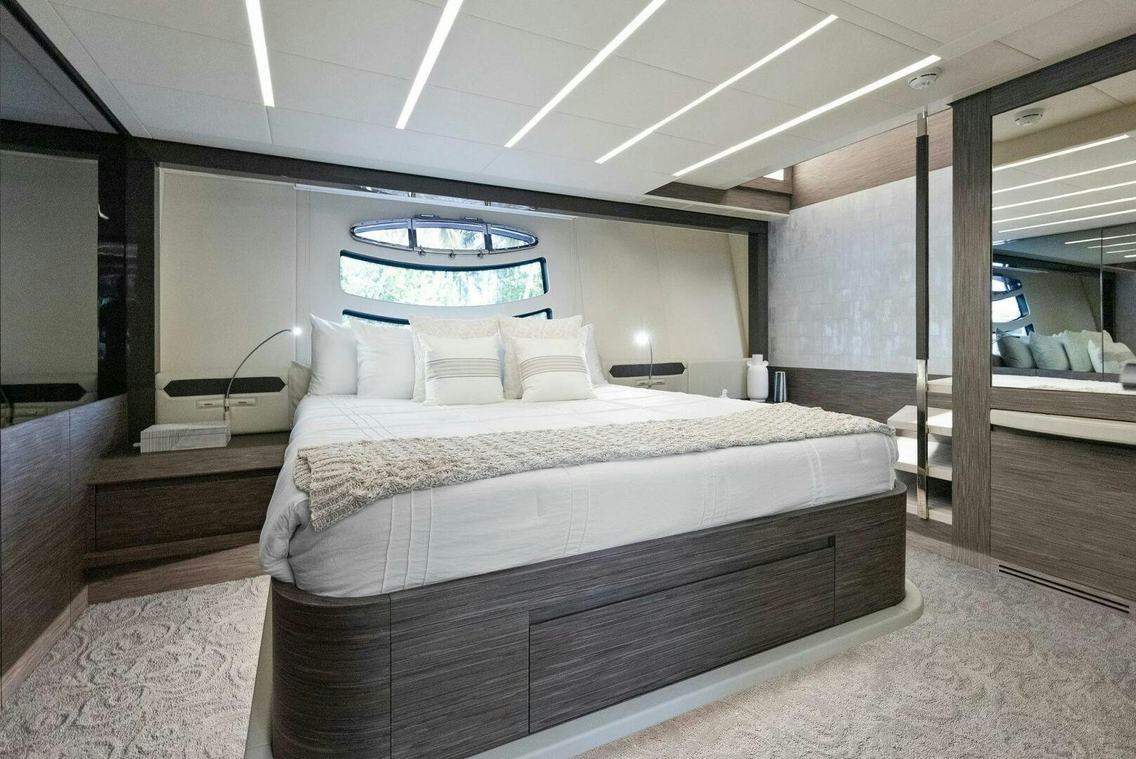 a large bed in a room aboard PHOENIX RISING Yacht for Sale