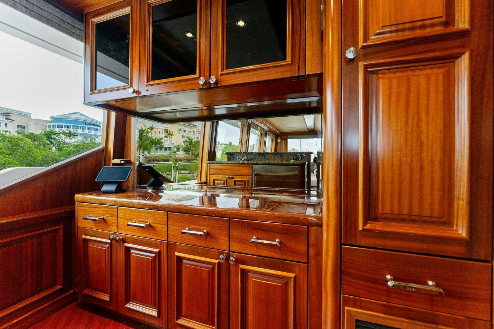 a kitchen with wooden cabinets aboard ANTARES Yacht for Sale