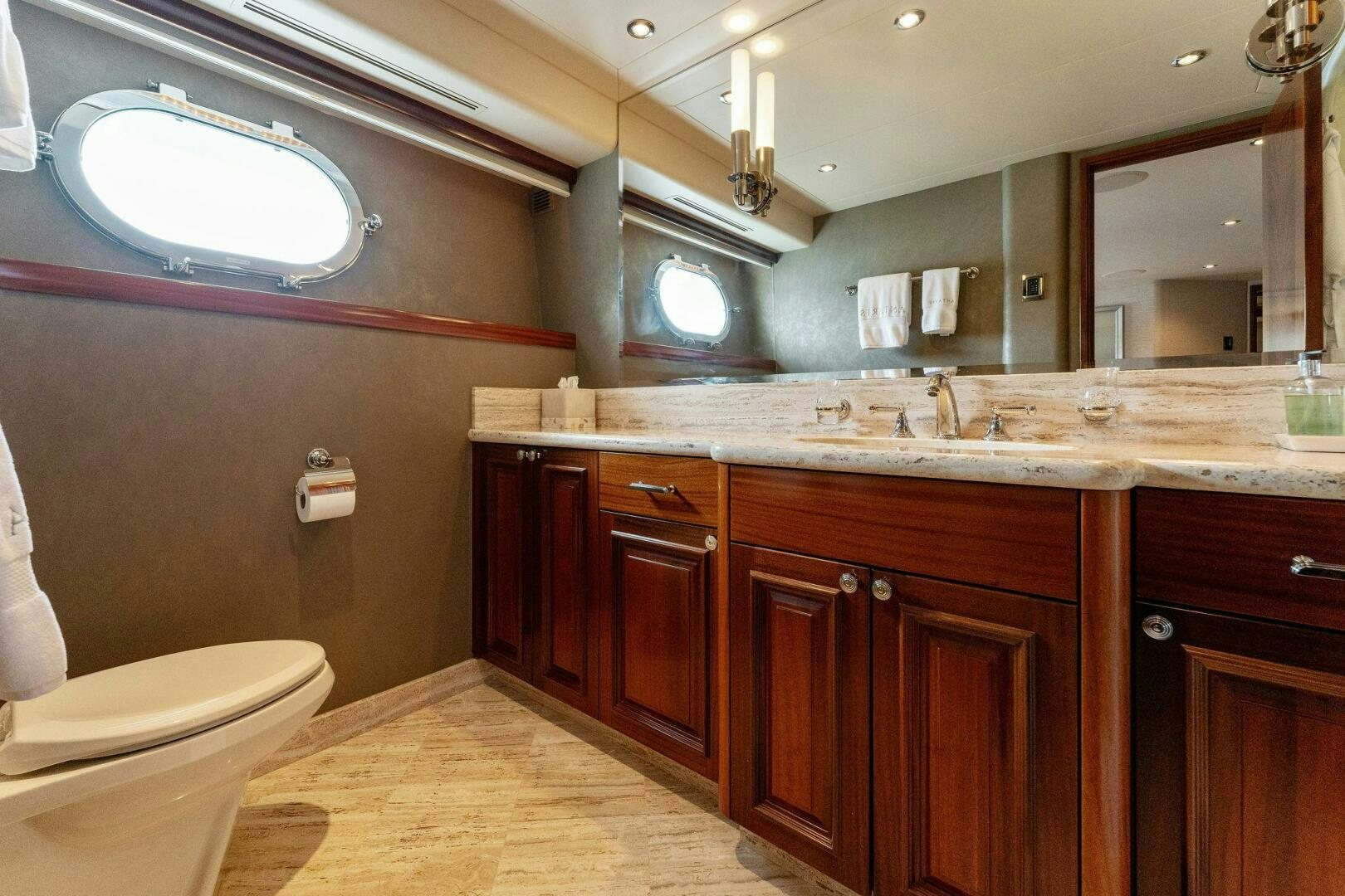 a bathroom with a large window aboard ANTARES Yacht for Sale