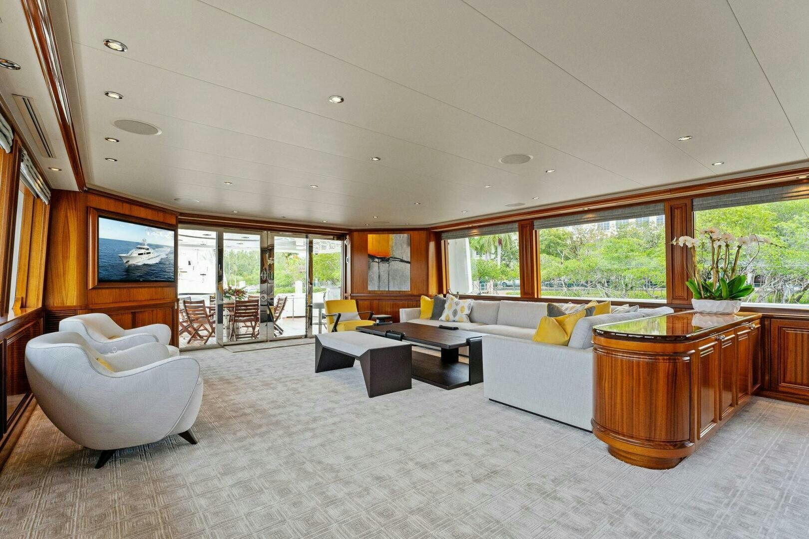 a living room with a large window aboard ANTARES Yacht for Sale
