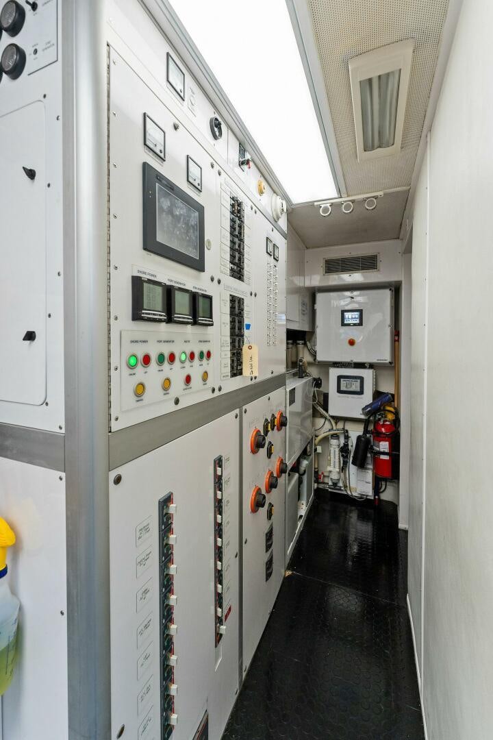 a hallway with white walls aboard ANTARES Yacht for Sale