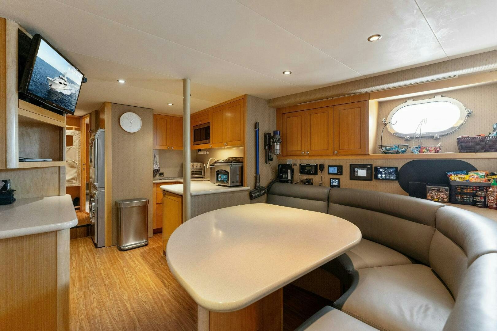 a living room with a large tv aboard ANTARES Yacht for Sale