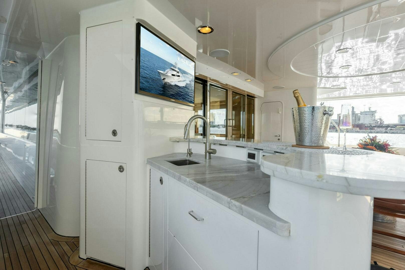 a kitchen with a large window aboard ANTARES Yacht for Sale