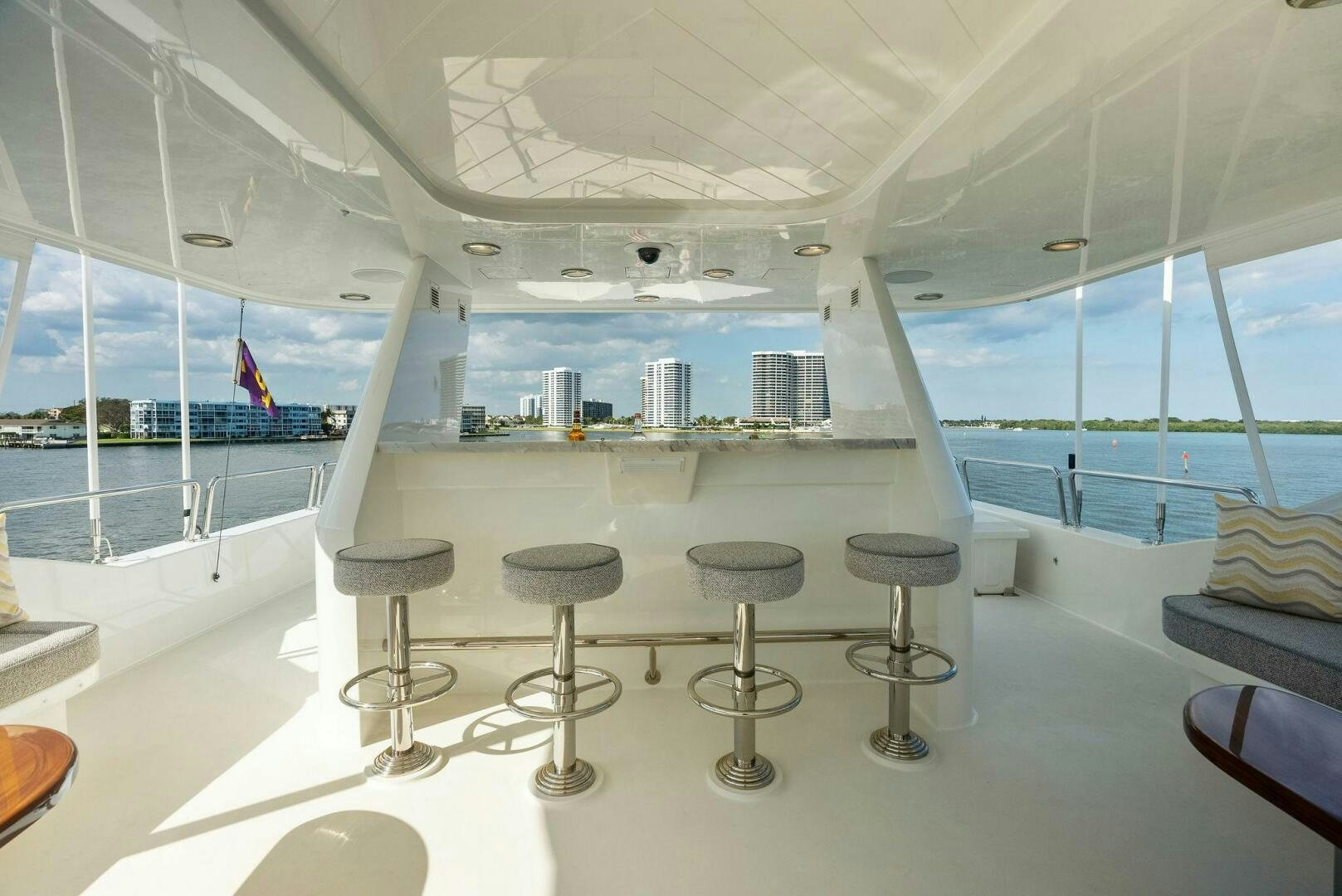 a room with a view of the water and the city aboard ANTARES Yacht for Sale