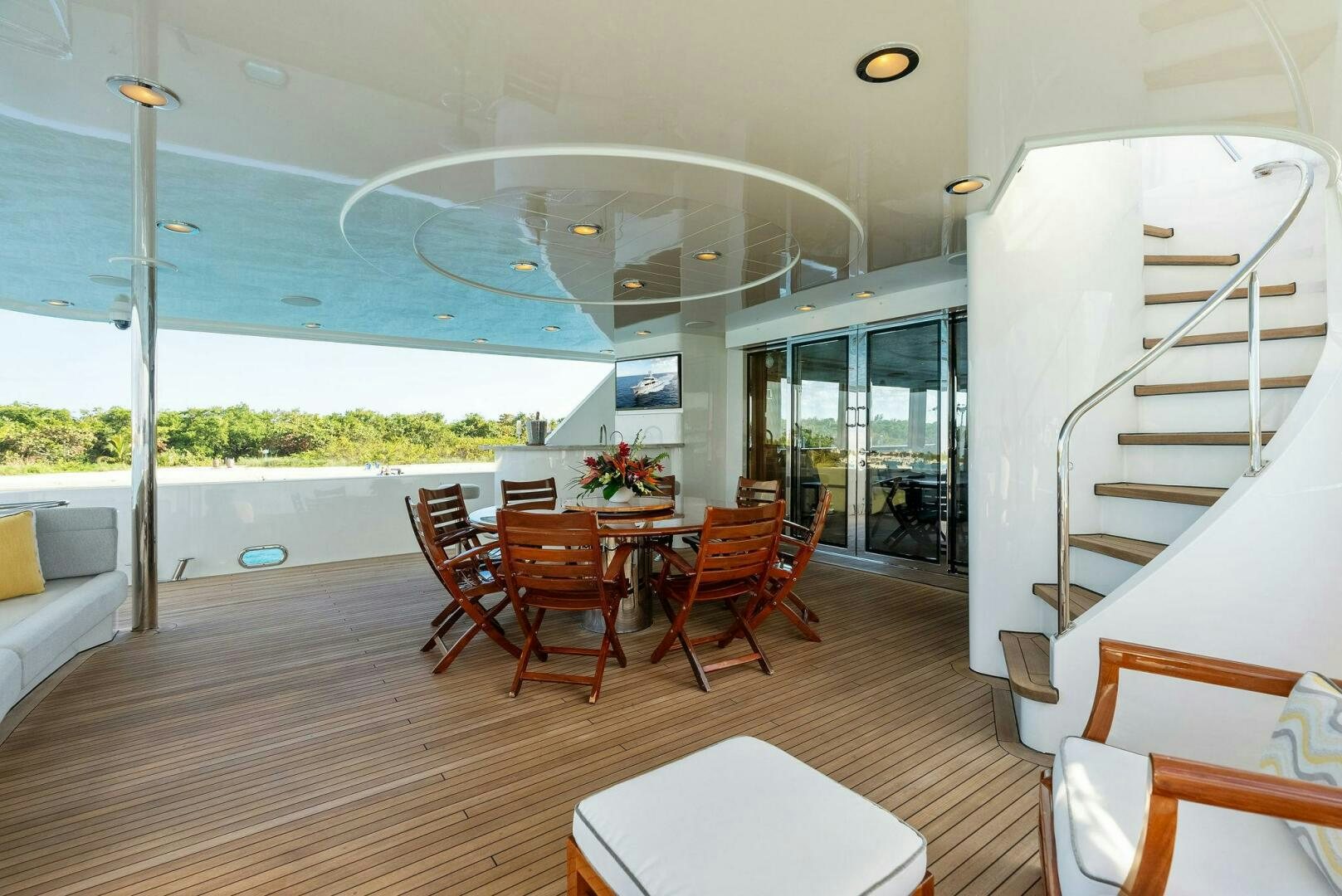 a room with tables and chairs aboard ANTARES Yacht for Sale