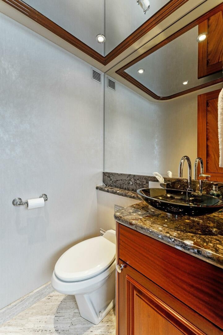 a bathroom with a sink and a toilet aboard ANTARES Yacht for Sale