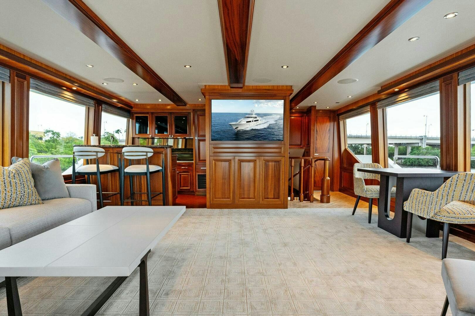 a room with a table and chairs aboard ANTARES Yacht for Sale
