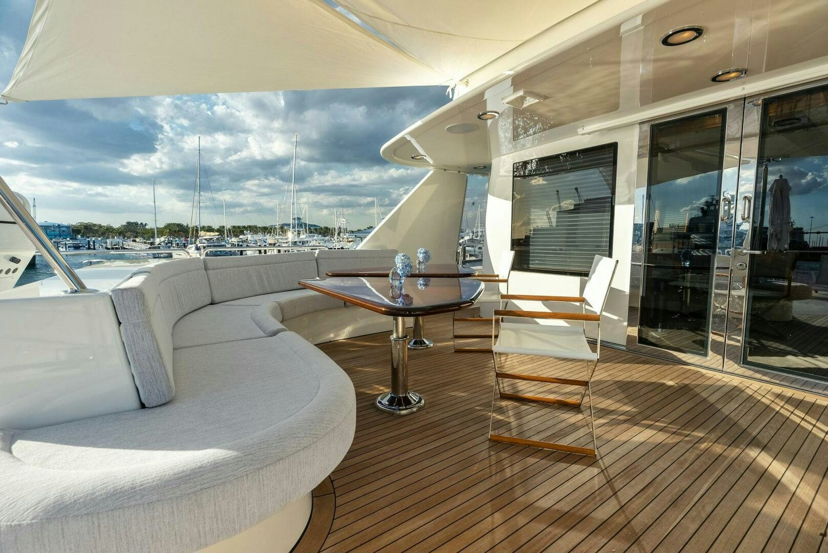 a room with a table and chairs aboard ANTARES Yacht for Sale