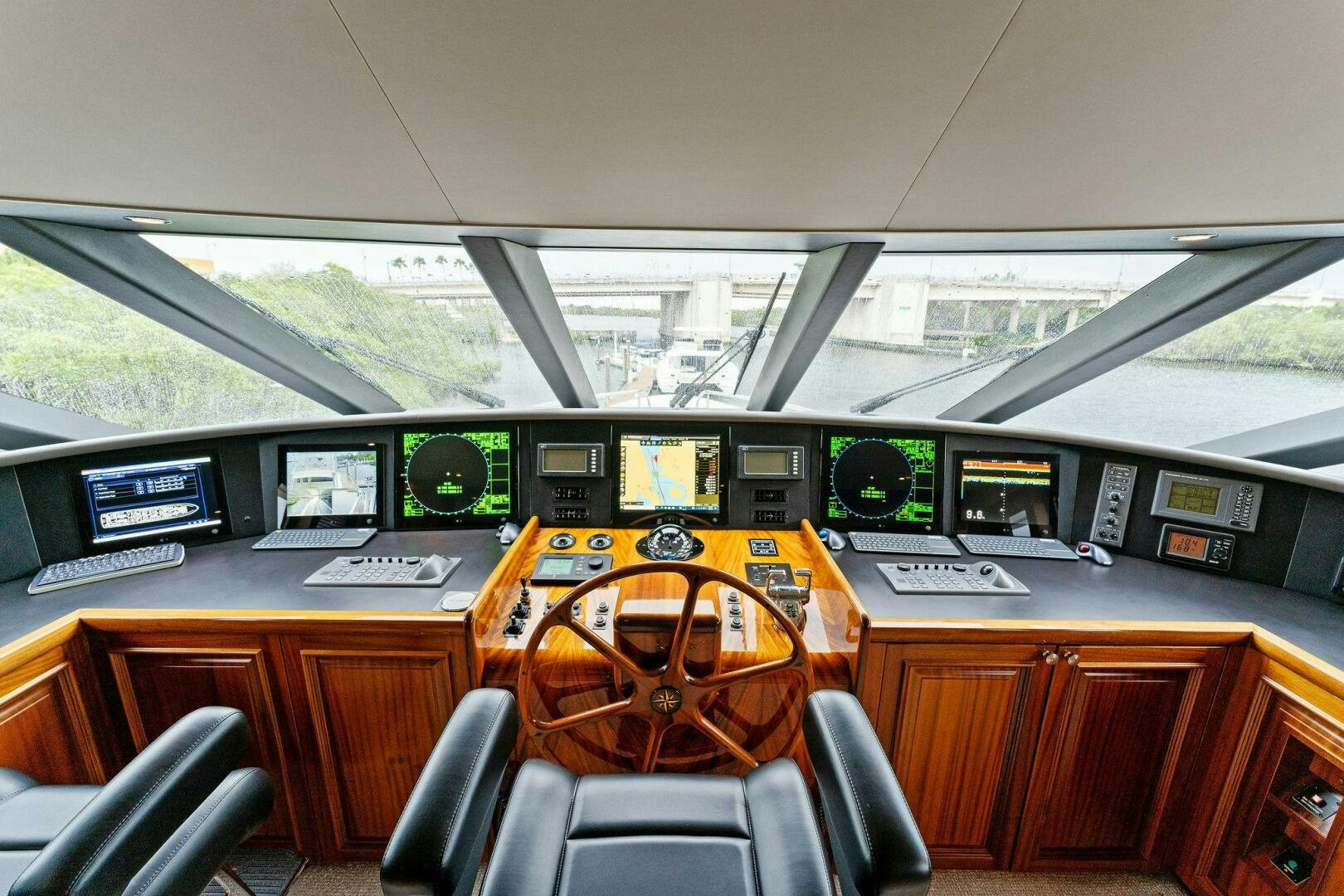 inside of a vehicle with screens and controls aboard ANTARES Yacht for Sale
