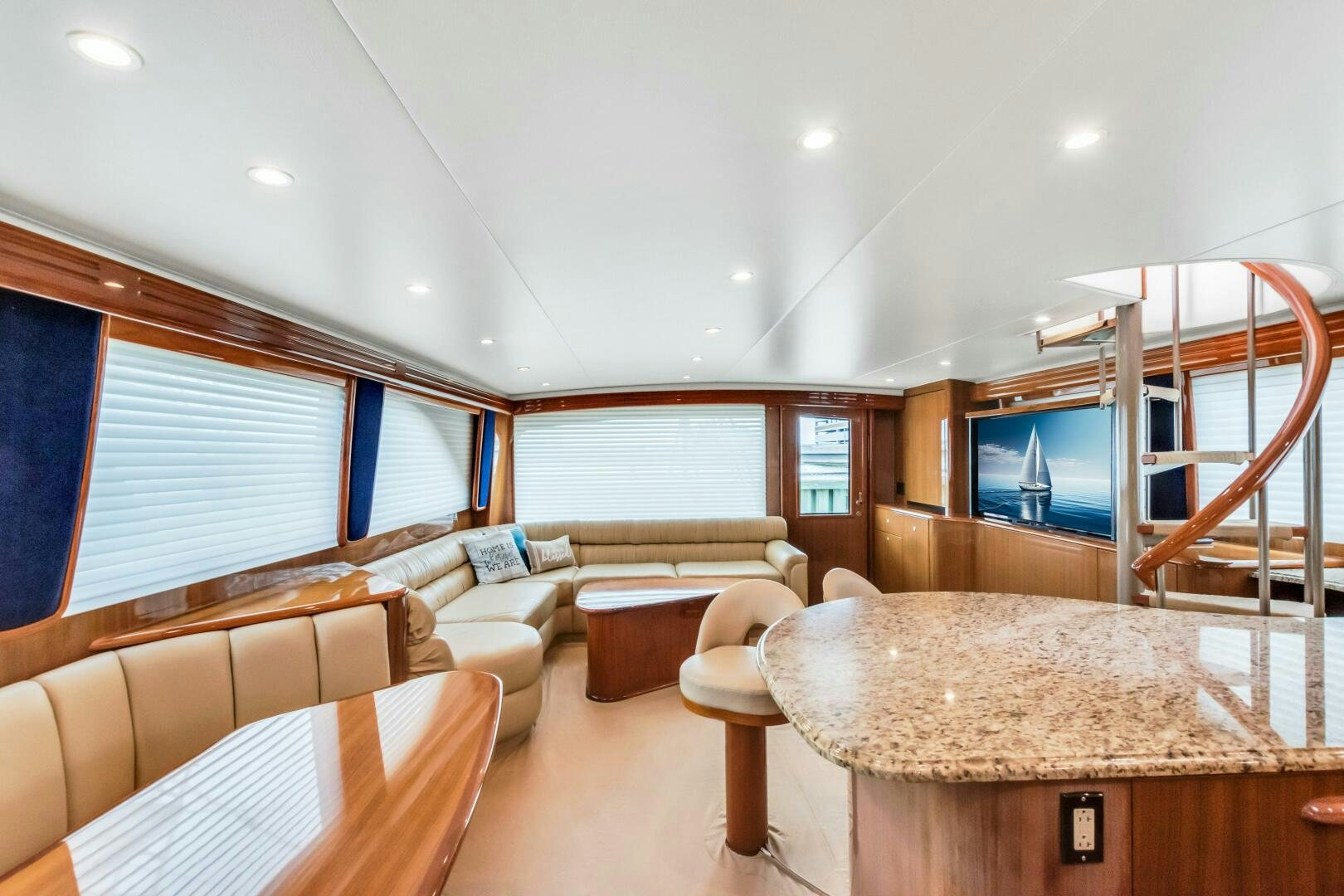 a living room with a large window aboard BERRY BLESSED Yacht for Sale