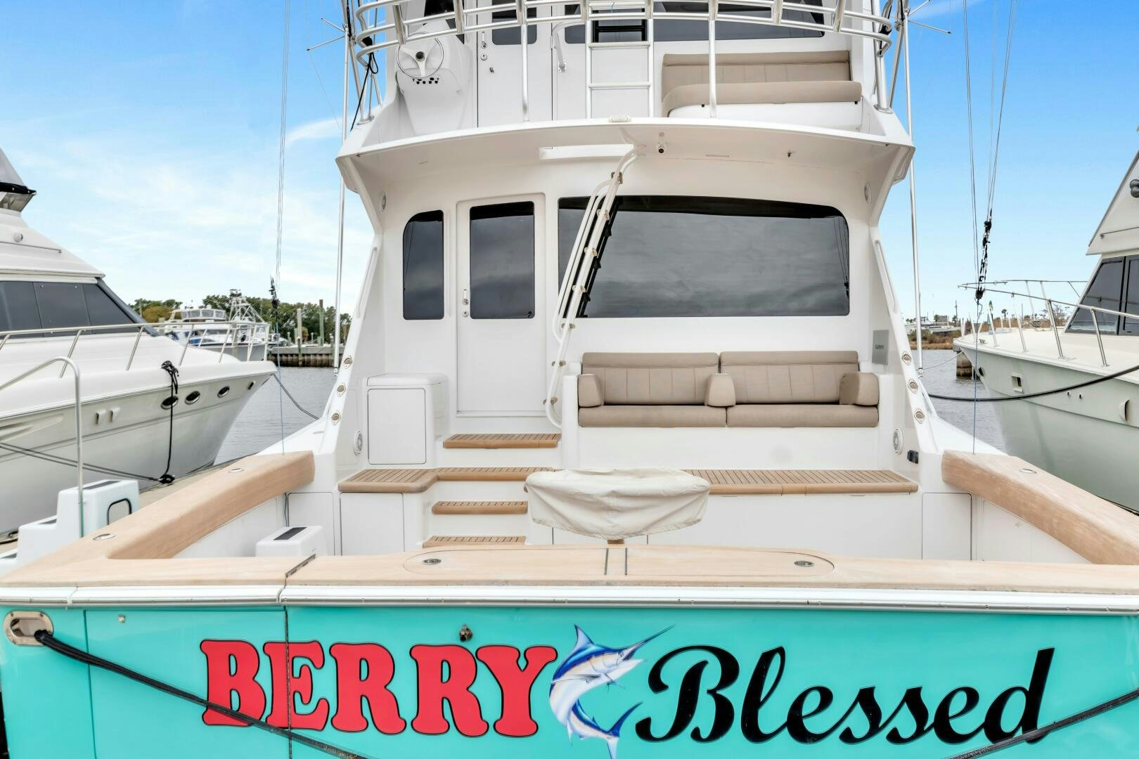 a boat with a sign on the front aboard BERRY BLESSED Yacht for Sale