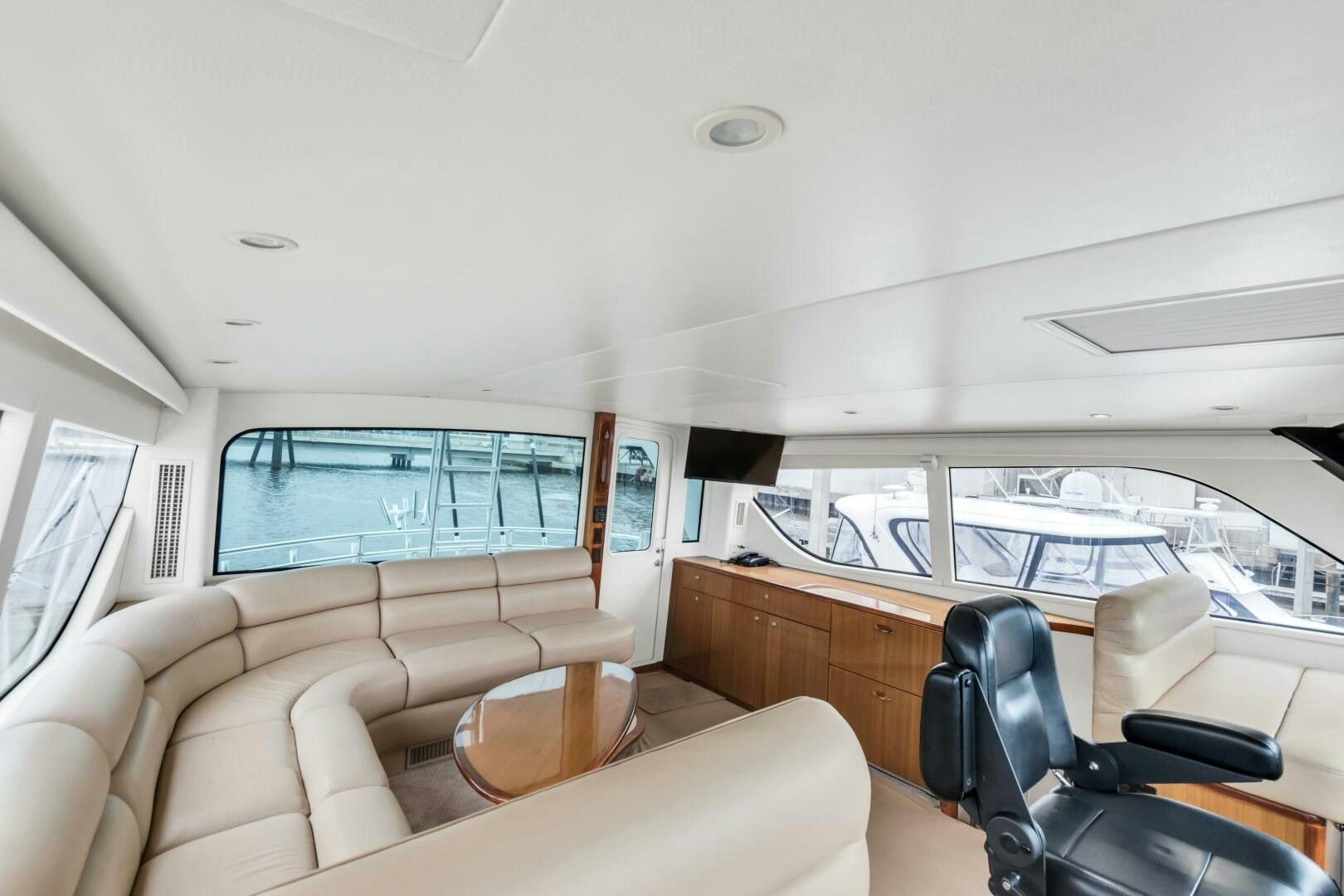 inside of a vehicle with a large window and a view of the water aboard BERRY BLESSED Yacht for Sale