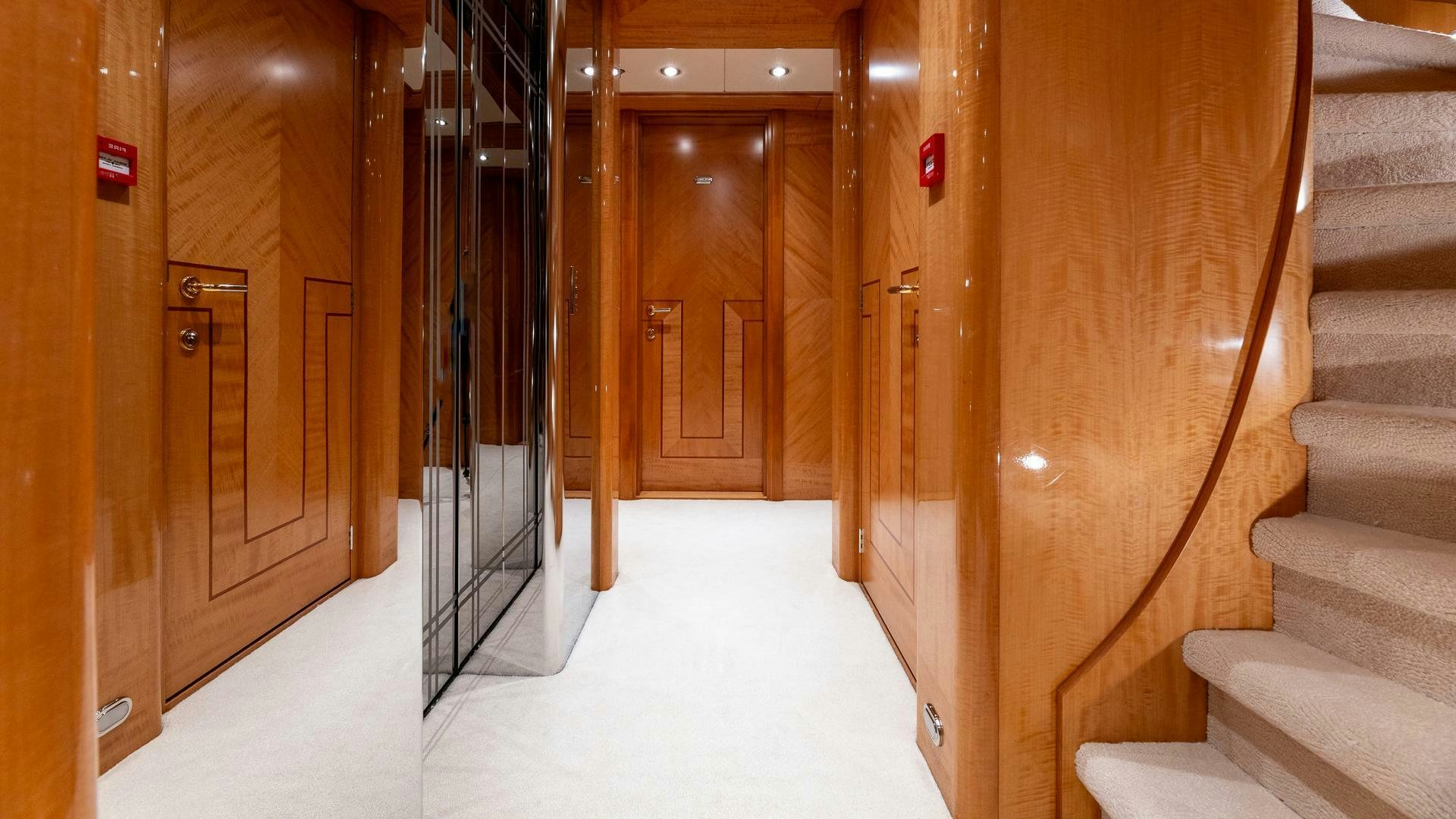 a hallway with a set of doors aboard AMANTI Yacht for Sale