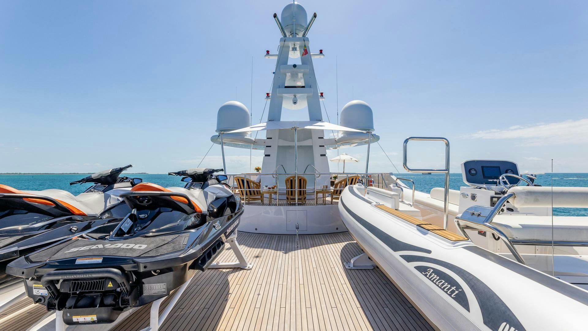 a boat docked at a pier aboard AMANTI Yacht for Sale