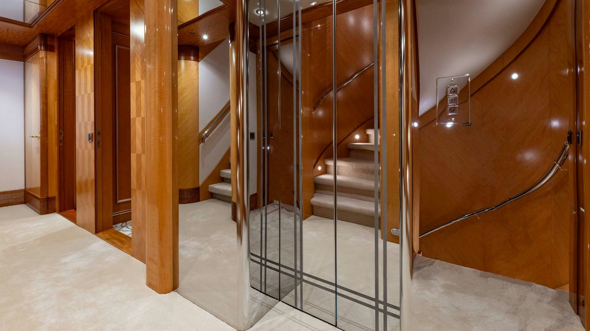 a room with a staircase and a set of stairs aboard AMANTI Yacht for Sale