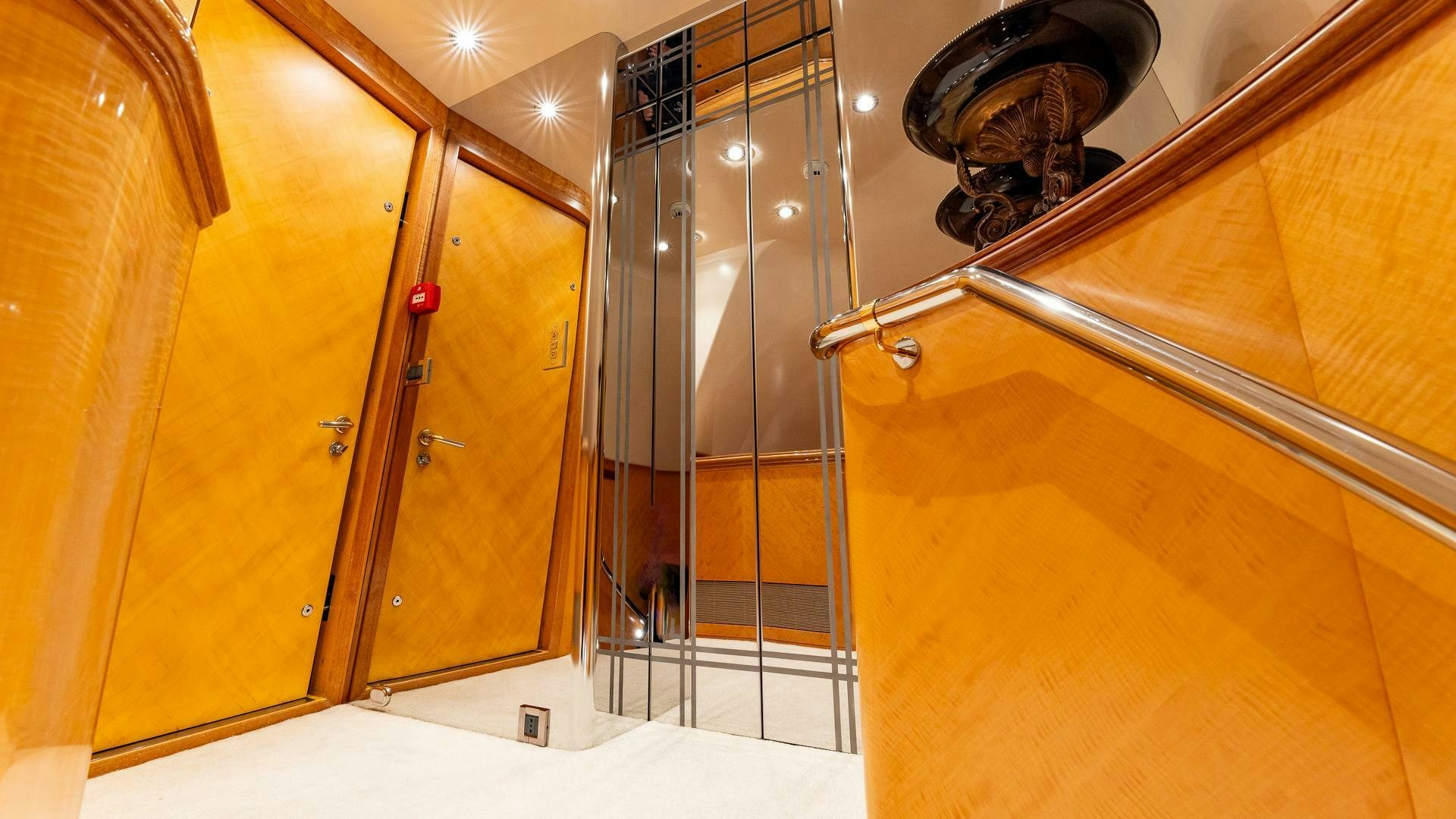 a large bathroom with a glass shower aboard AMANTI Yacht for Sale
